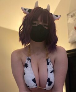 Mika mae wearing white bra and horns on head