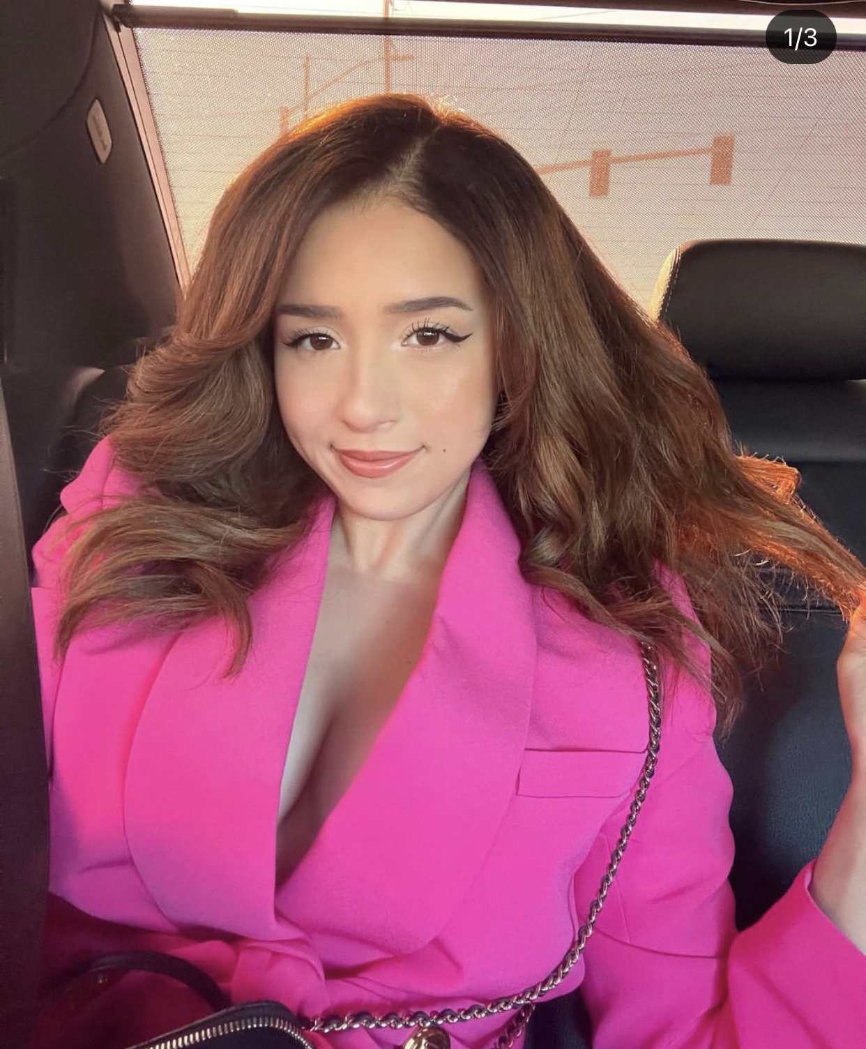 Twitch streamer Pokimane in pink dress 